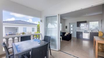 Deluxe Apartment, 1 Bedroom, Pool View, Ground Floor | Terrace/patio