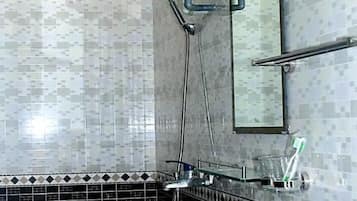 Shower, free toiletries, slippers, towels