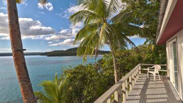 Habitación cuádruple panorámica, 2 camas de matrimonio, vistas al mar, frente al mar | Terraza o patio