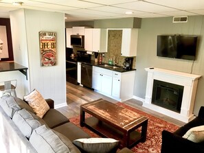 Smart TV, fireplace, books