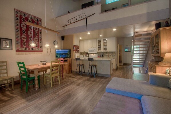 TV, fireplace, books