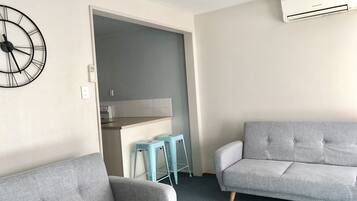 Apartment, 2 Bedrooms, Private Bathroom | Living room | Flat-screen TV, Netflix