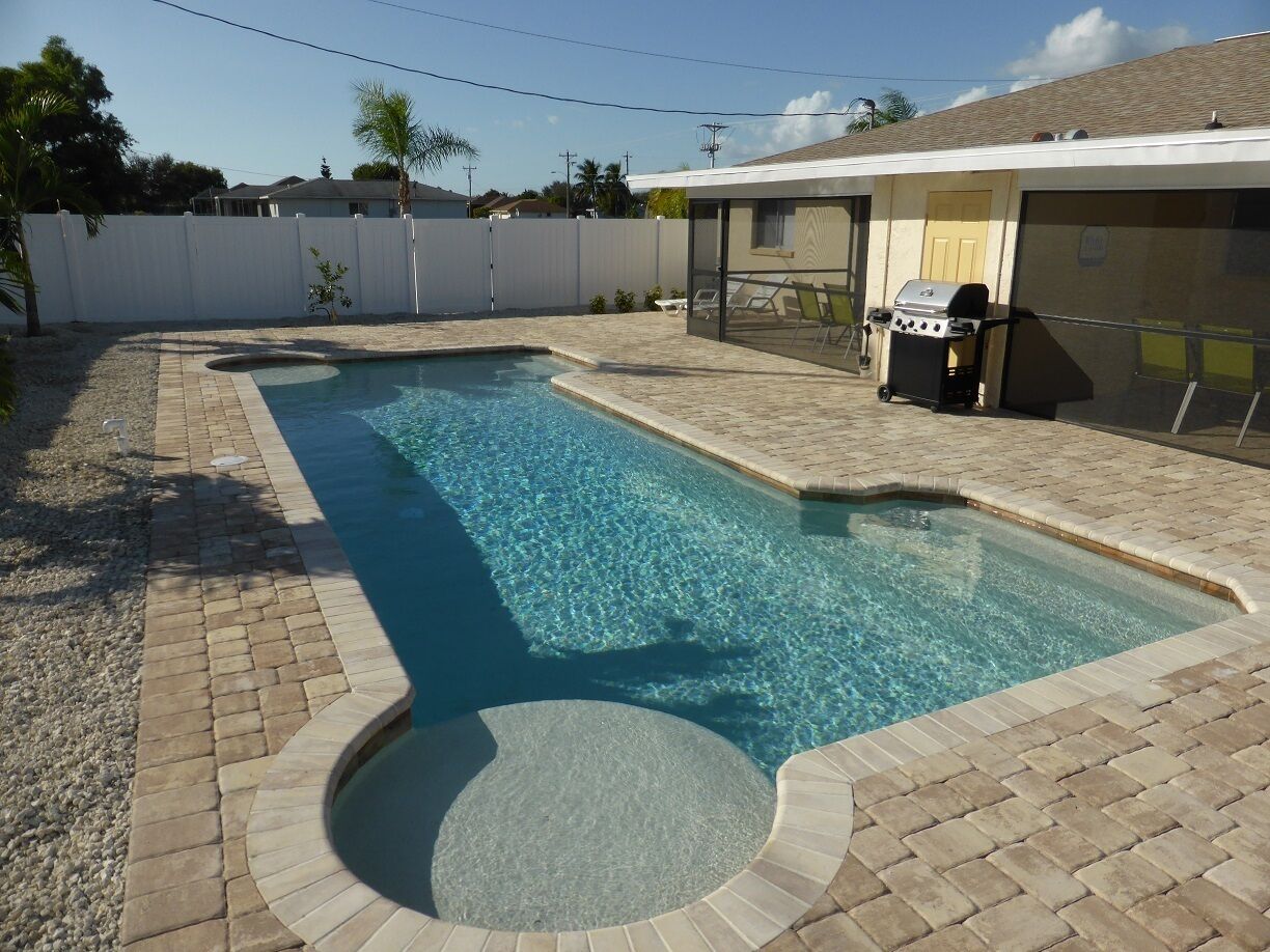 A heated pool, a lap pool, sun loungers