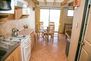 家庭小屋, 3 间卧室, 双浴室 | 私人厨房 | 冰箱、微波炉、炉灶、厨具/餐具