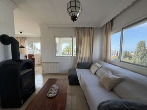 Flat-screen TV, fireplace
