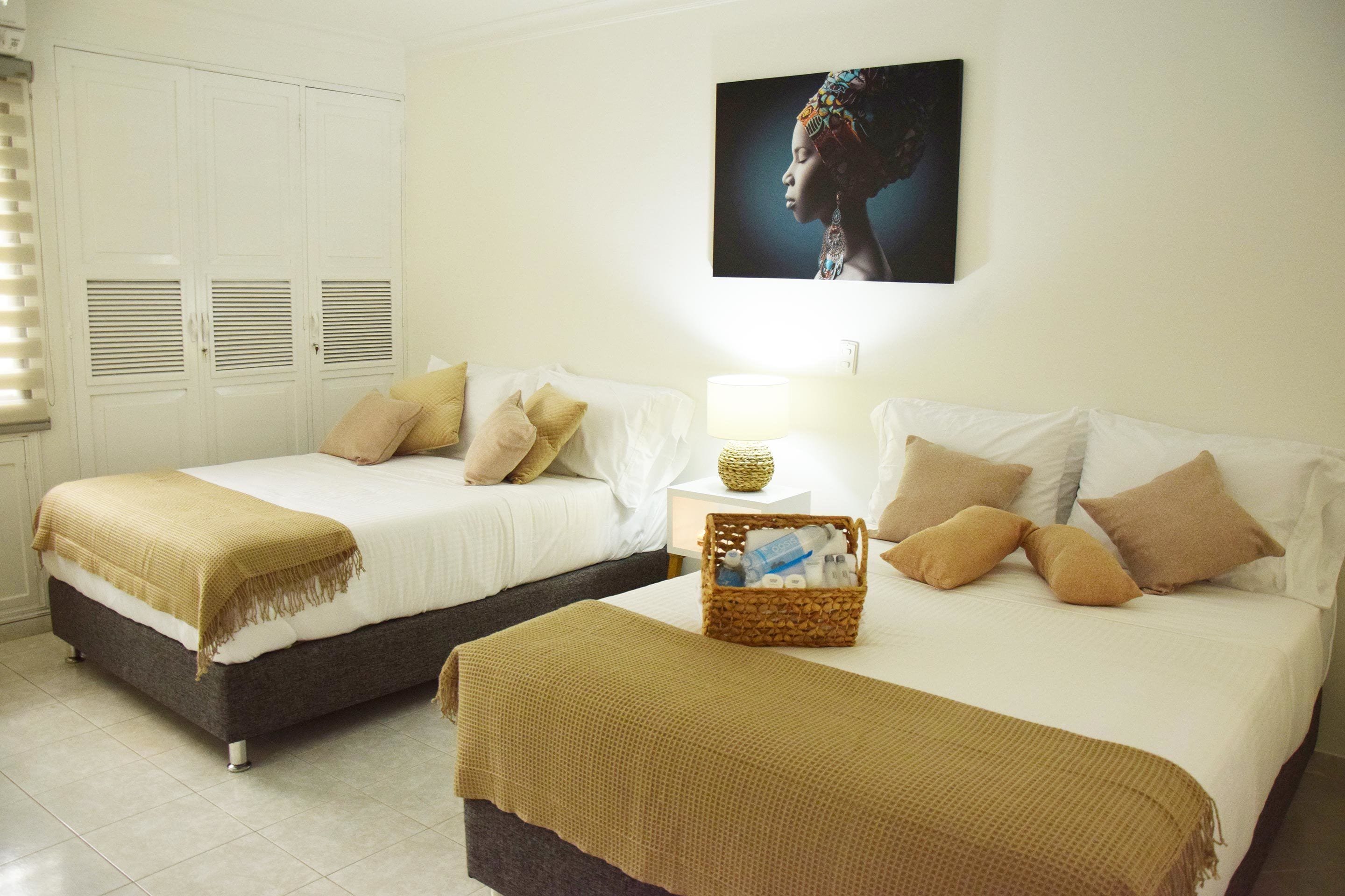 deluxe double room, 2 double beds, non smoking, garden area | iron/ironing board, free wifi, bed sheets