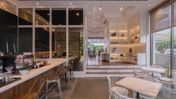 Breakfast, lunch, dinner served; local cuisine