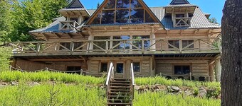 Custom lakefront lodge with game room, dock & plenty of space