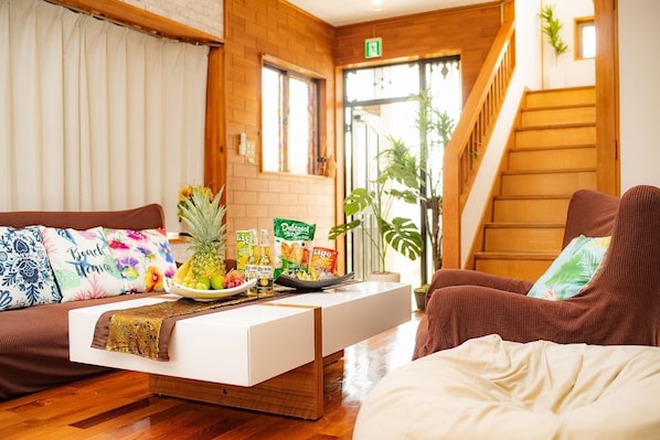 Private Vacation Home (1 to 10 Guests) | Living room | Flat-screen TV