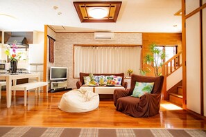 Private Vacation Home (1 to 10 Guests) | Living room | Flat-screen TV