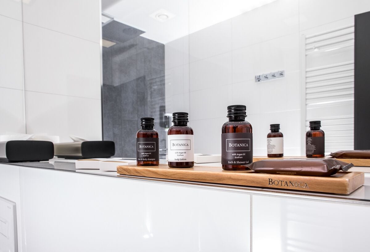 business double room | bathroom | designer toiletries, hair dryer, slippers, towels