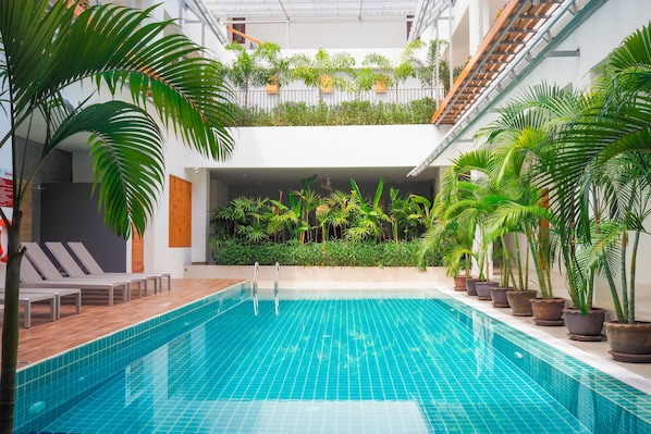 Outdoor pool, sun loungers