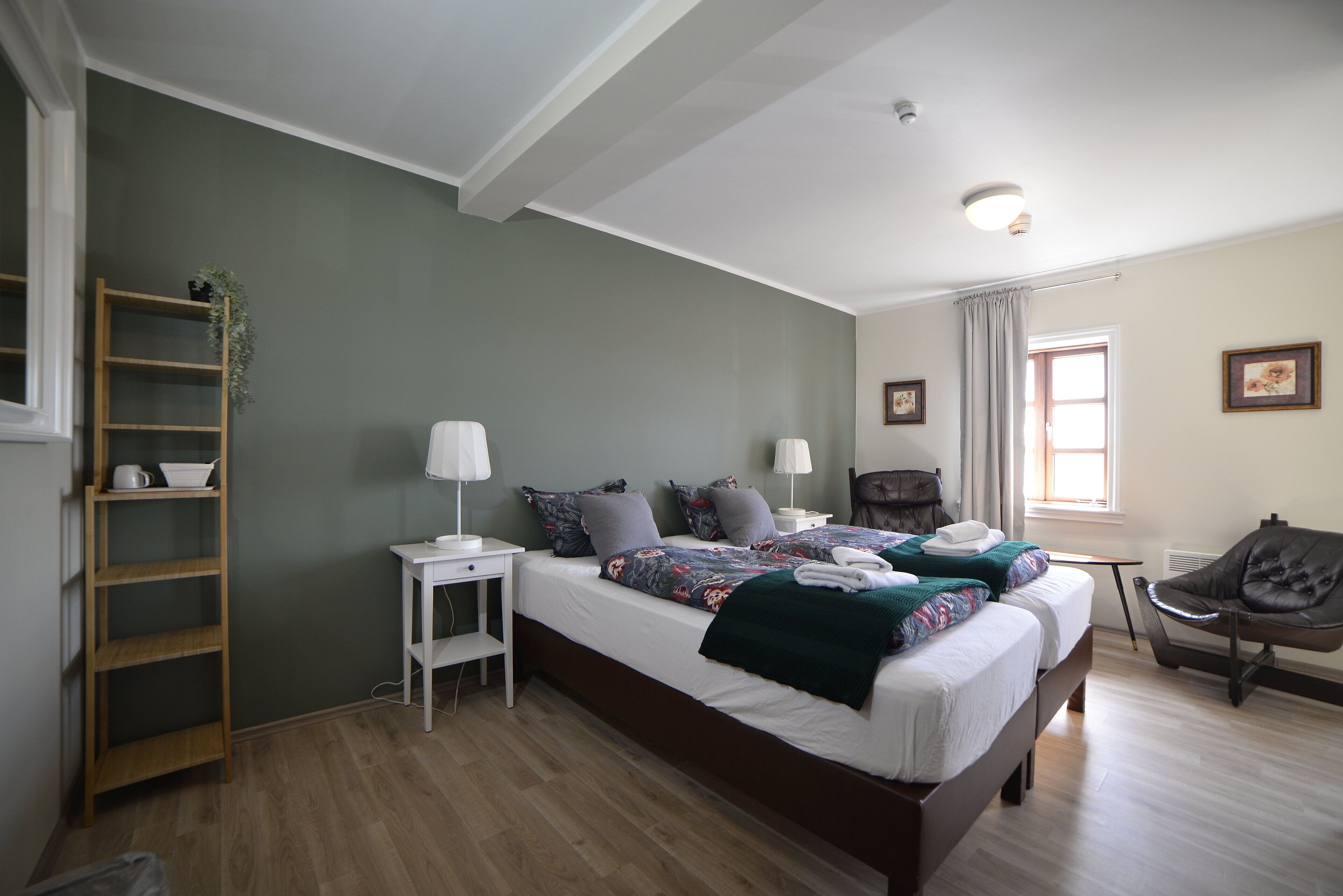 Triple Room, Private Bathroom | Blackout drapes, iron/ironing board, free WiFi, bed sheets