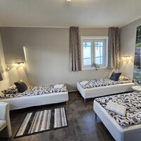 Apartment, 3 Bedrooms | Blackout drapes, free WiFi, bed sheets