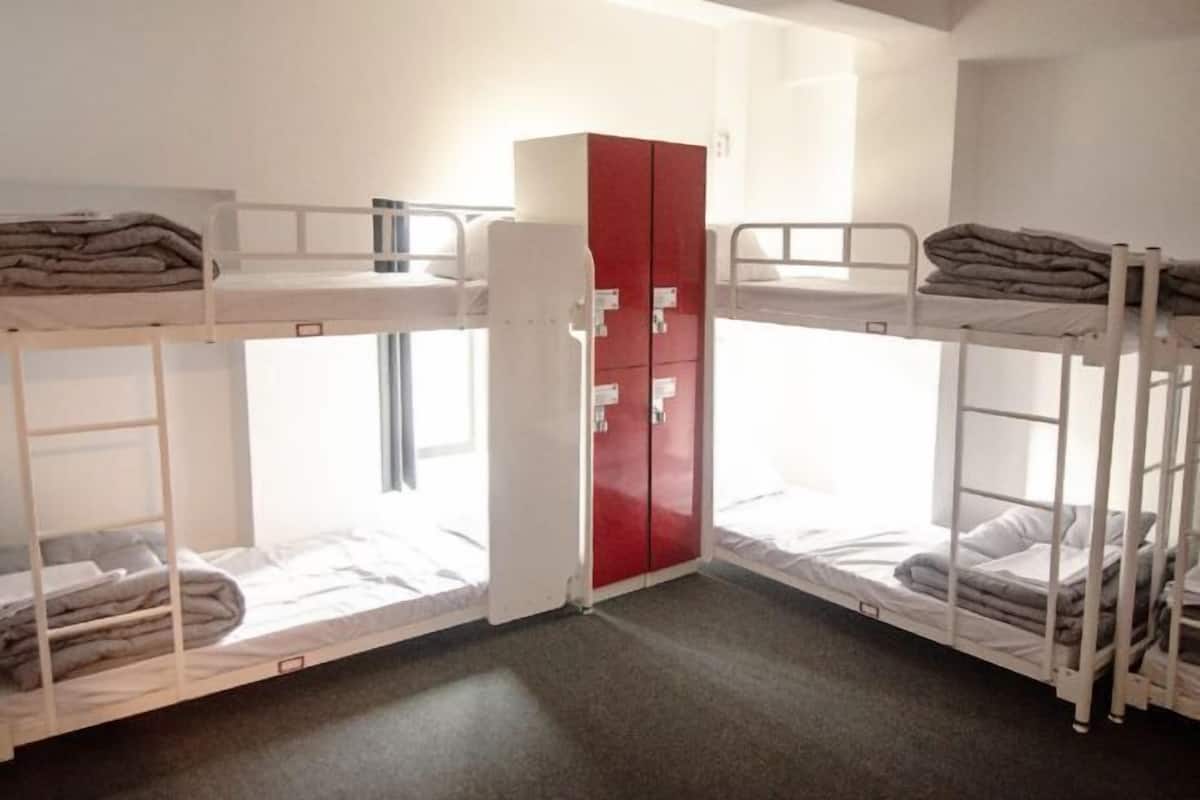 Premium bedding, blackout drapes, soundproofing, free WiFi