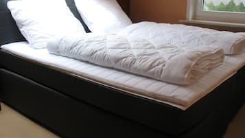 Down duvets, pillow-top beds, individually furnished, iron/ironing board