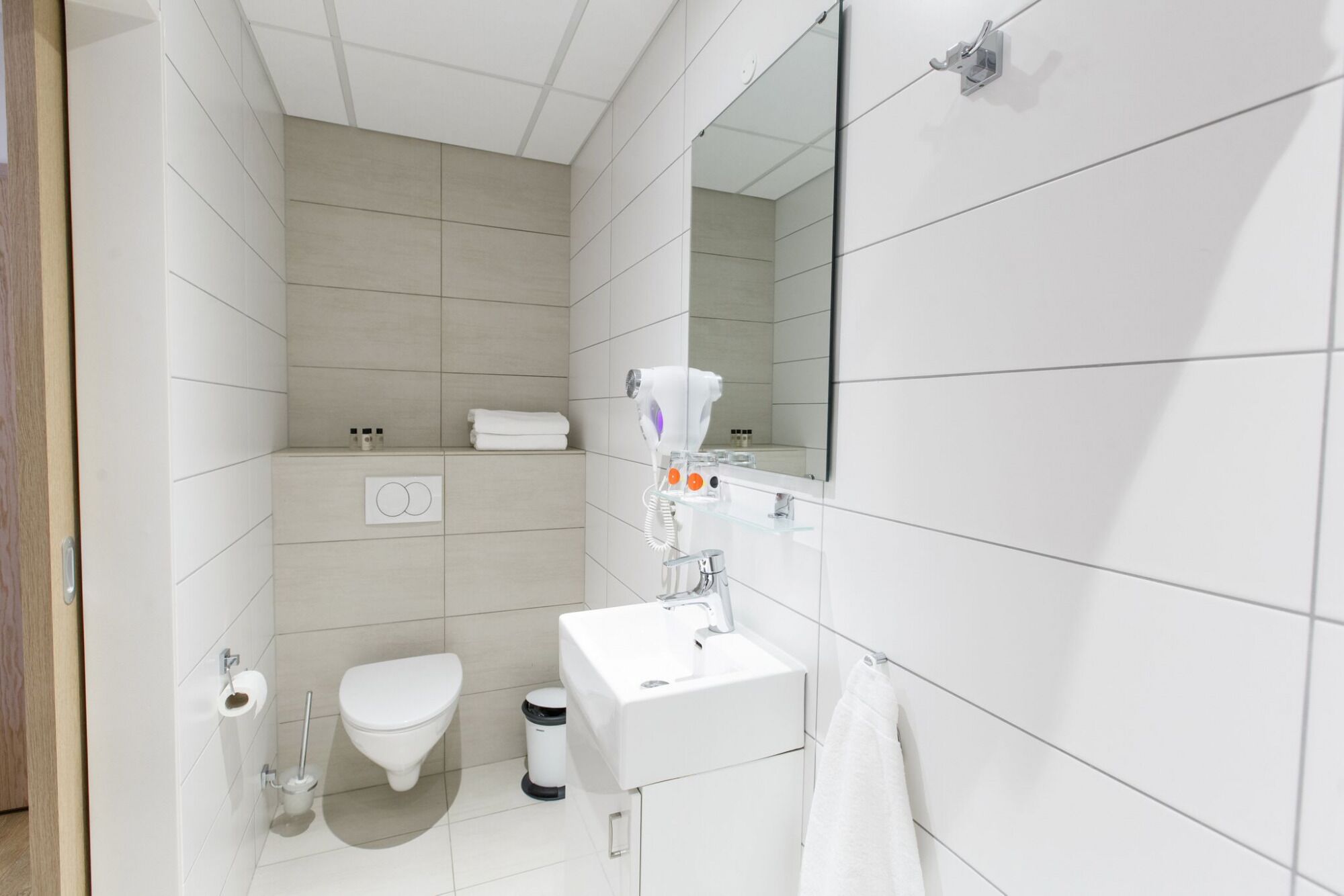 hair dryer, towels, soap, shampoo