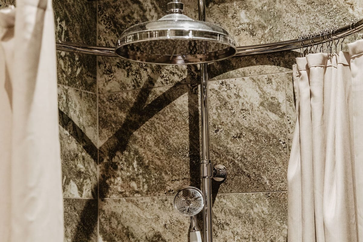 basic double room | bathroom | shower, rainfall showerhead, designer toiletries, hair dryer