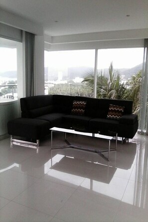 One Bedroom Condo | Living area | Flat-screen TV - Sunset Plaza by Wachinee (Karon)