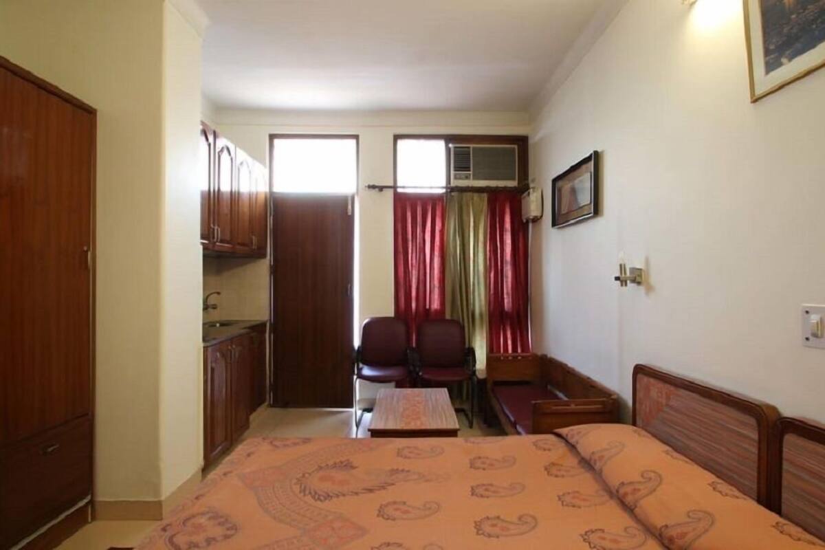 Desk, blackout curtains, iron/ironing board, rollaway beds