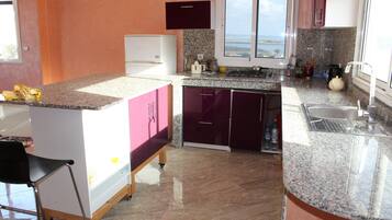 Apartment, 1 Bedroom | Private kitchen | Fridge, microwave, oven, stovetop