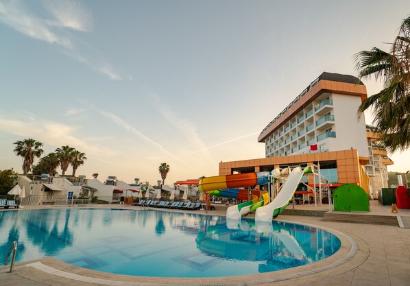 Indoor pool, outdoor pool, pool umbrellas, sun loungers