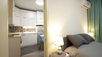 Departamento, 1 habitación | 1 habitación, tabla de planchar con plancha y ropa de cama