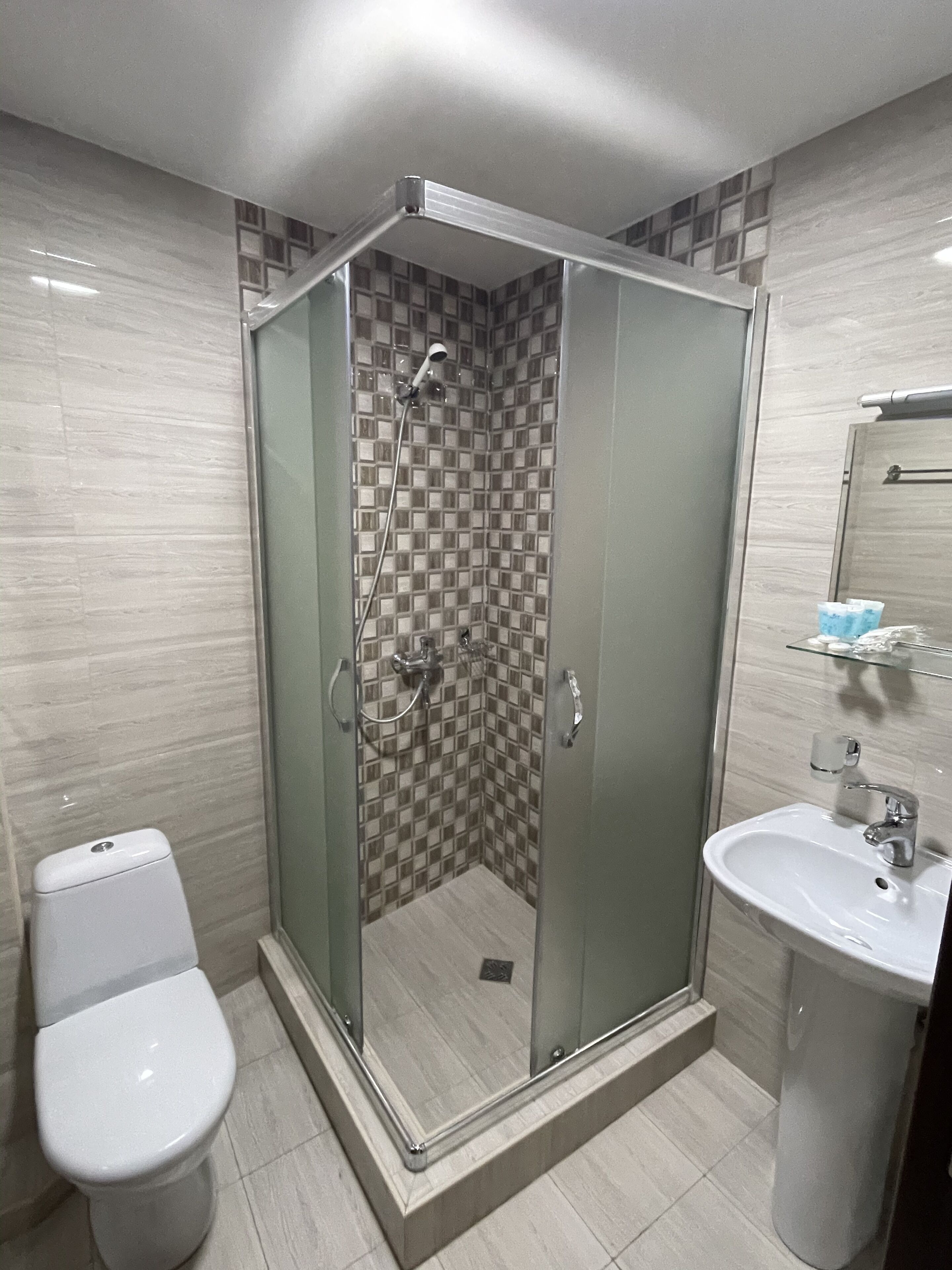 family room | bathroom | shower, free toiletries, hair dryer, bathrobes