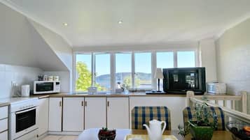 Apartment (The Top Cottage (1)) | Private kitchen | Full-size fridge, microwave, oven, stovetop