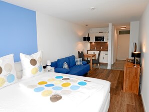 Basic Apartment, 1 Bedroom, Non Smoking, Kitchenette | Living area | 49-inch flat-screen TV with cable channels, TV, DVD player