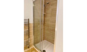 Shower, free toiletries, towels, soap