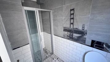 Standard Double Room, Partial Sea View | Bathroom | Shower, free toiletries, hair dryer