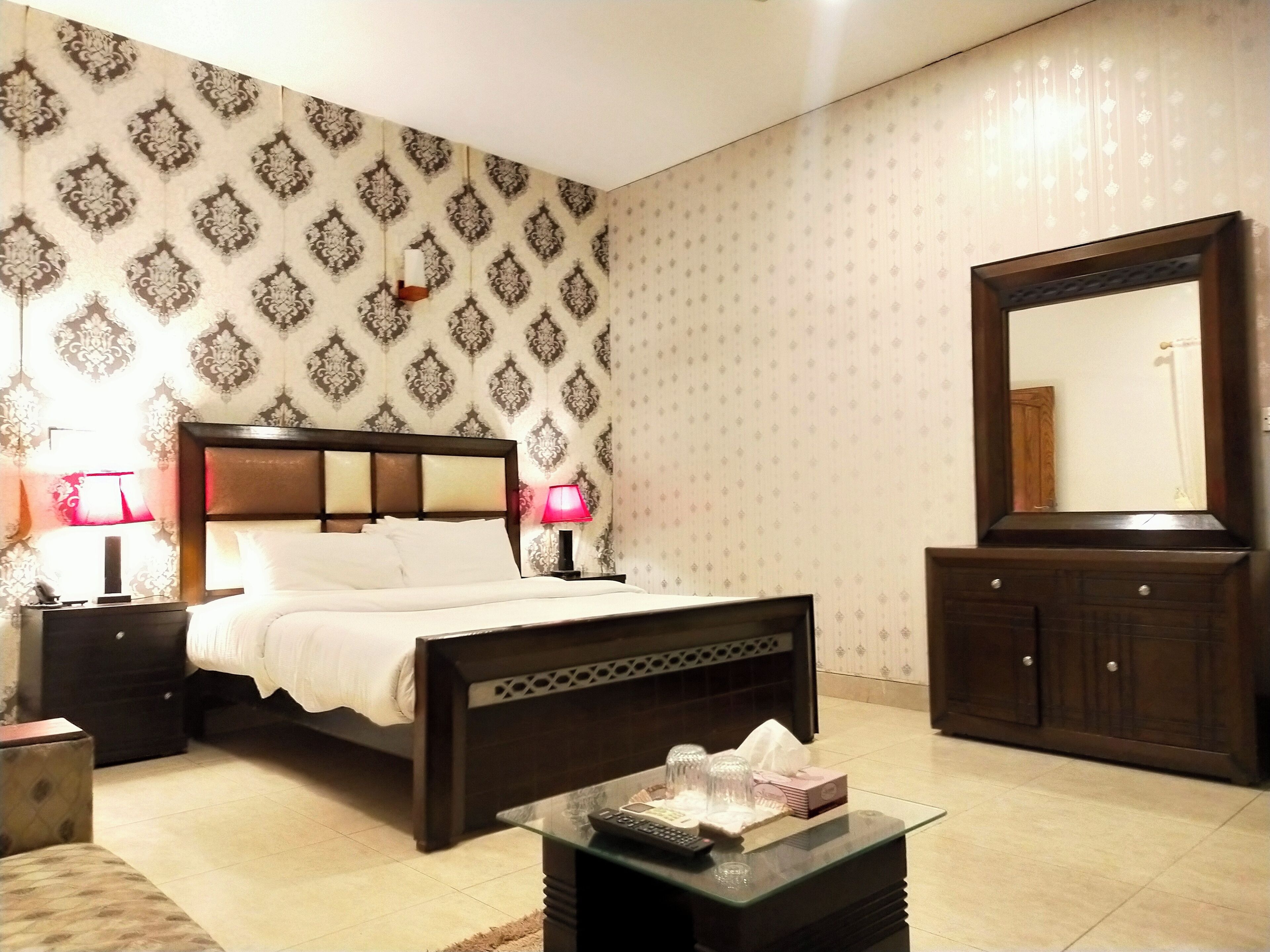 Deluxe Room, 1 King Bed, City View | Minibar, desk, laptop workspace, iron/ironing board