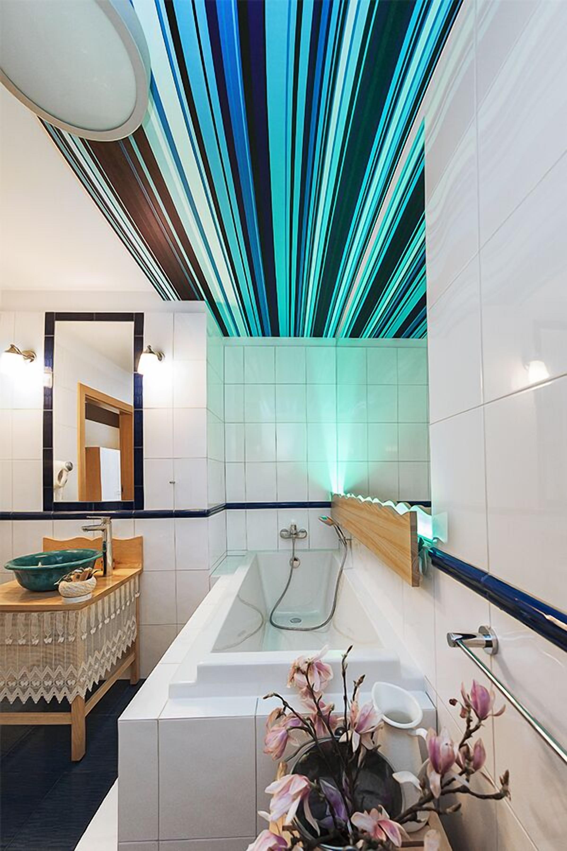 superior studio suite | bathroom | free toiletries, hair dryer, bathrobes, slippers