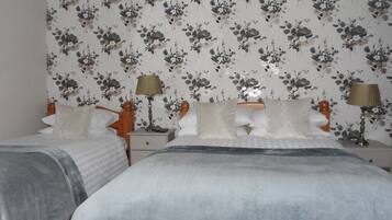 Family Double or Twin Room | Individually furnished, desk, free WiFi, bed sheets
