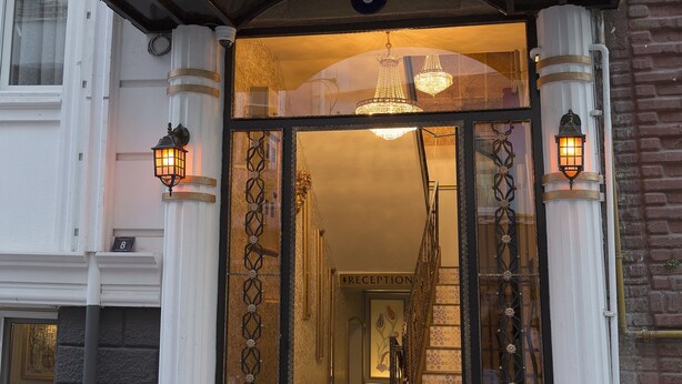 The entrance of the hotel with a sign reading "ZH HOTEL ZH". - Zeynep Hatun Otel (Biga)