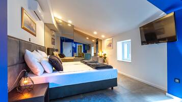 Premium bedding, down comforters, Select Comfort beds, in-room safe