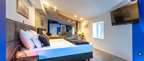 Premium bedding, down duvets, Select Comfort beds, in-room safe