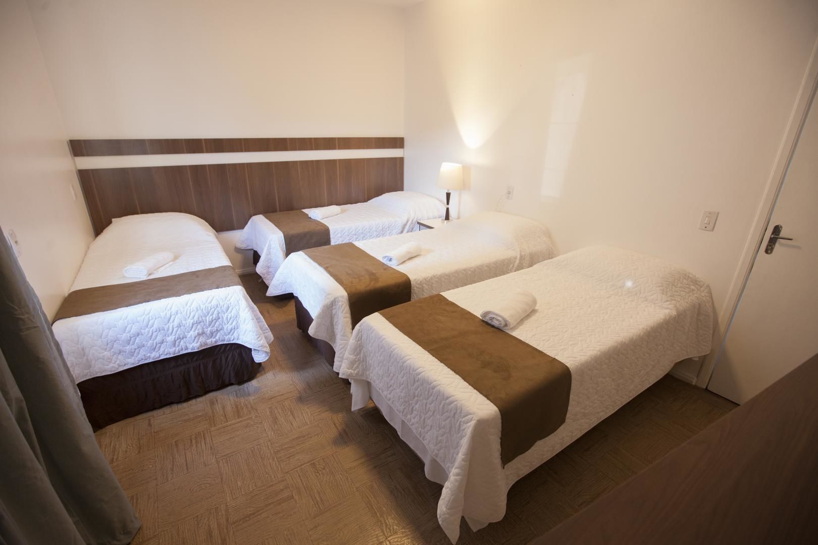 standard quadruple room | minibar, individually furnished, desk, laptop workspace