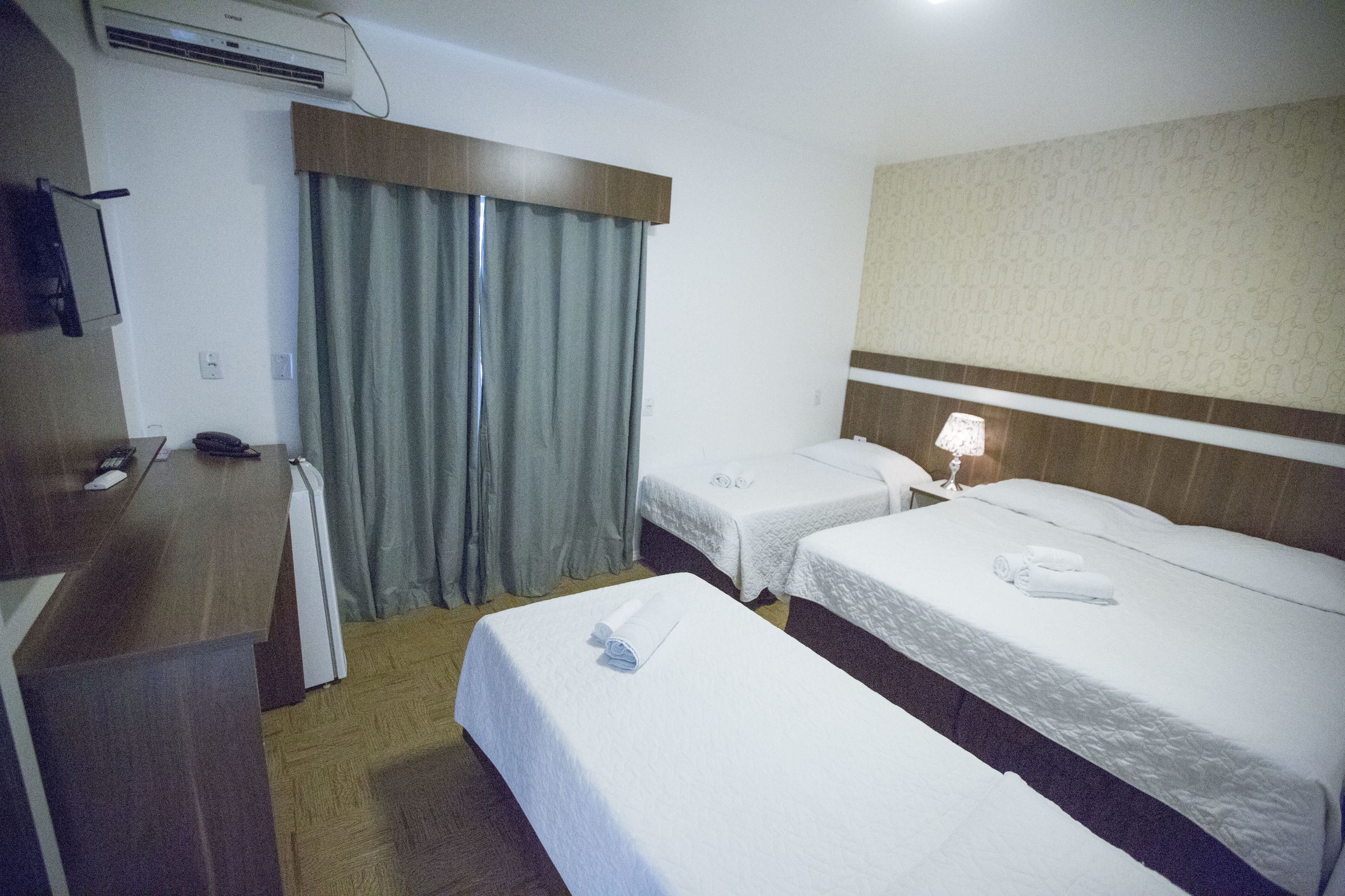 standard quadruple room | minibar, individually furnished, desk, laptop workspace