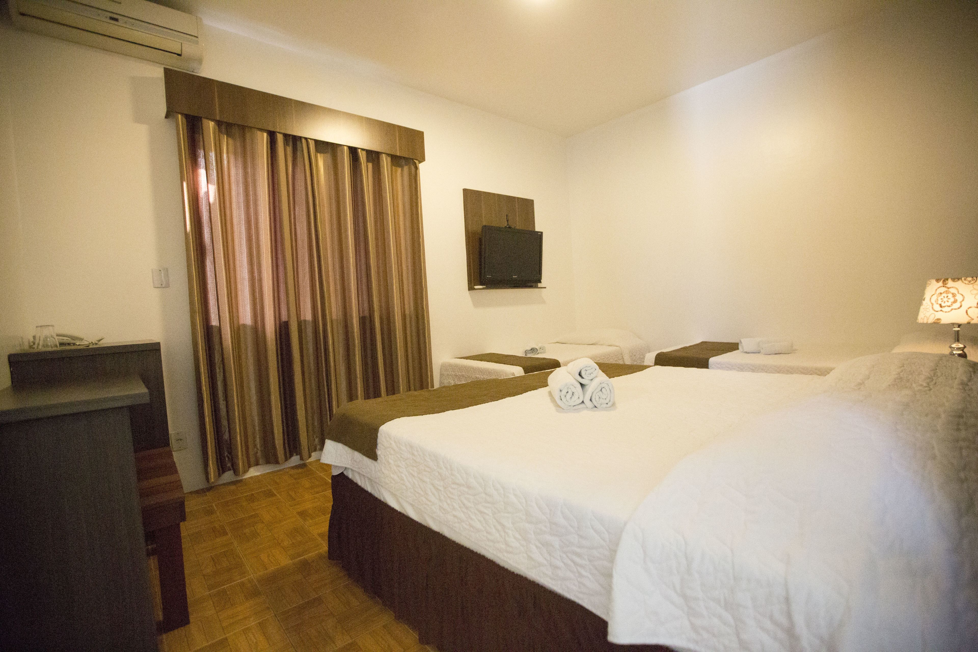 standard quadruple room | minibar, individually furnished, desk, laptop workspace