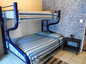 Departamento familiar, 2 habitaciones, junto a la alberca | 2 habitaciones, ropa de cama de alta calidad y wifi gratis 