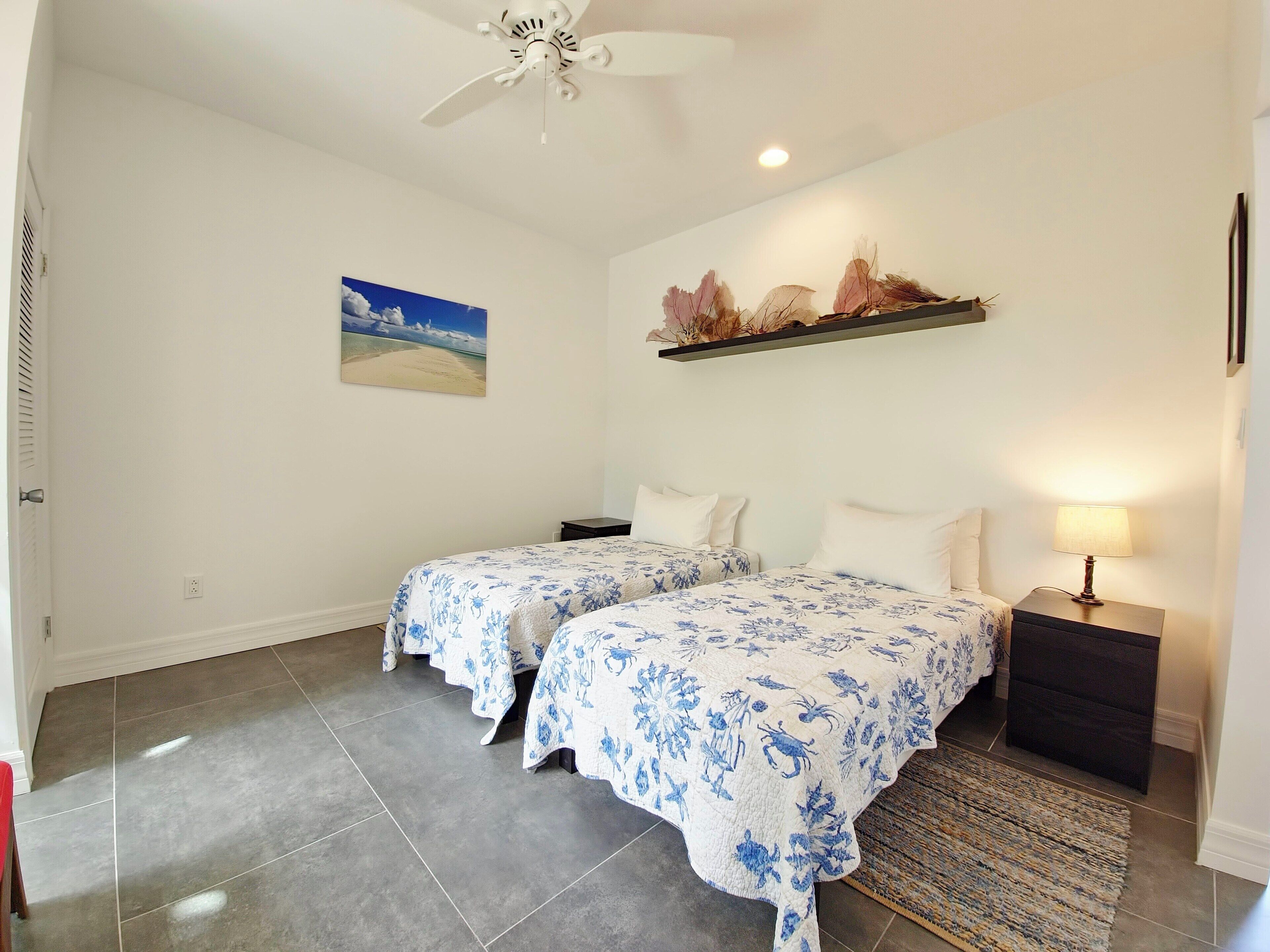 basic room, multiple beds, non smoking, beach view | iron/ironing board, free wifi, bed sheets