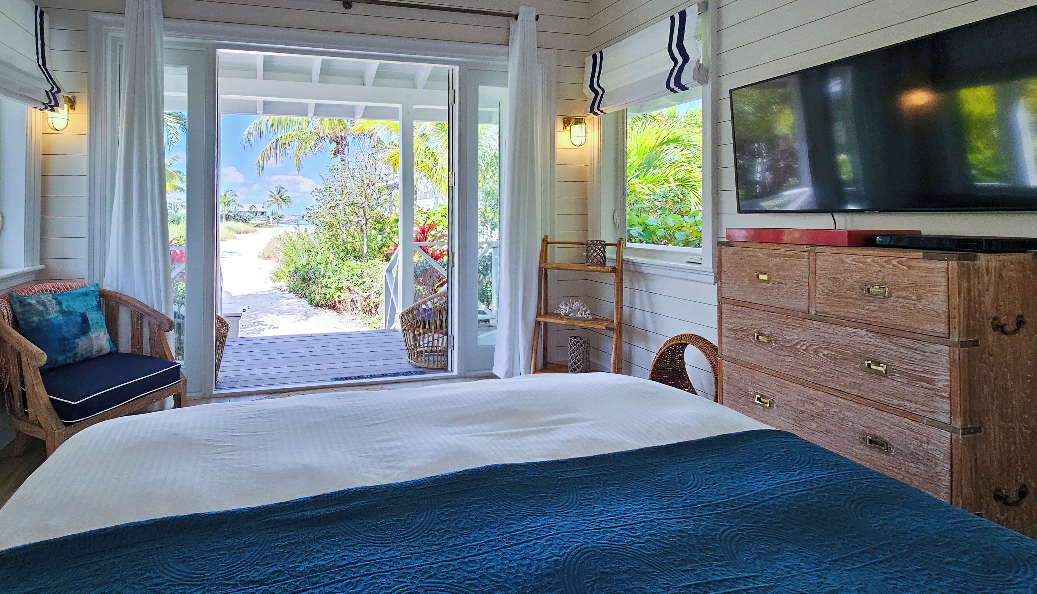 bungalow, 1 king bed, ocean view | iron/ironing board, free wifi, bed sheets