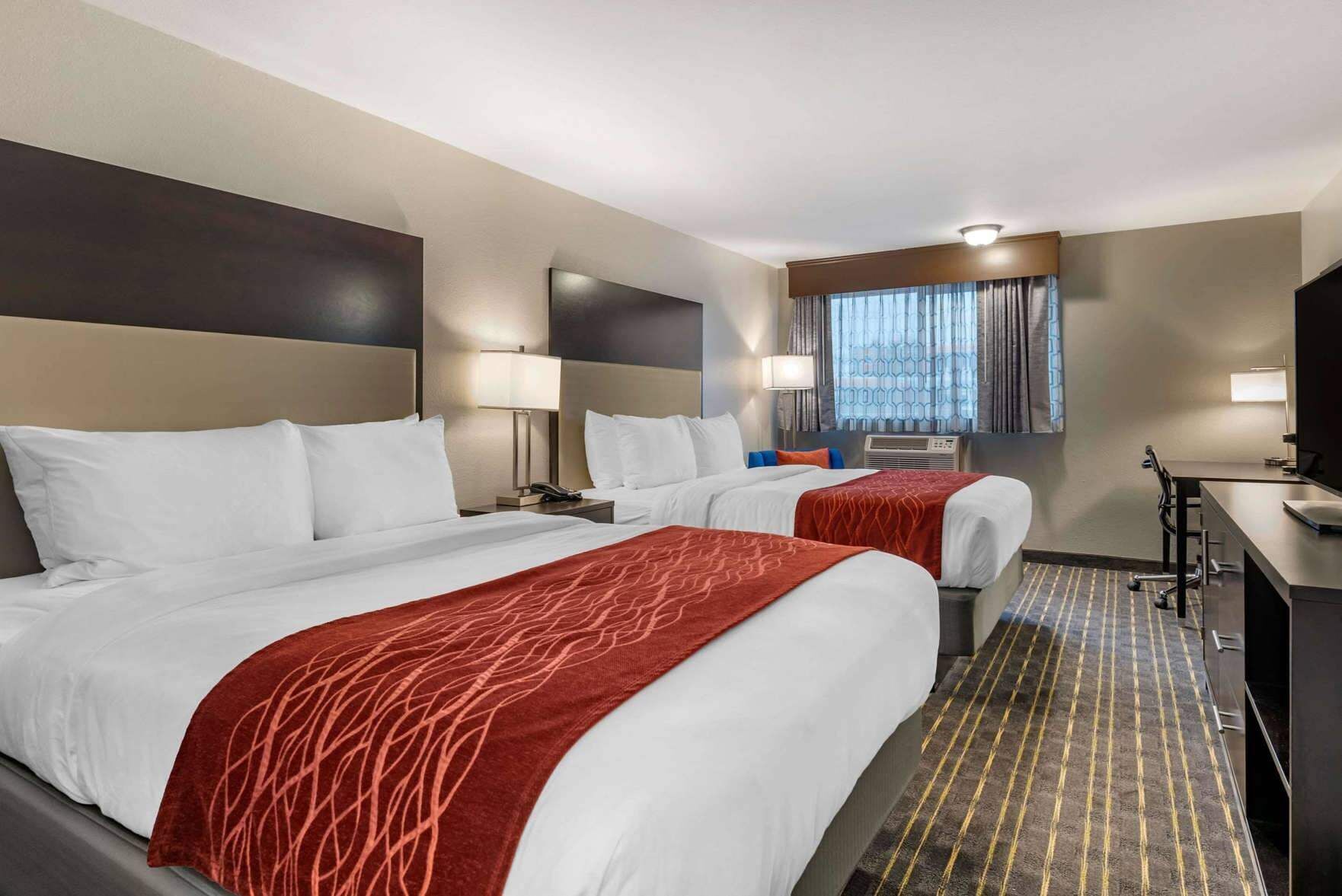 Premium bedding, pillowtop beds, blackout drapes, iron/ironing board