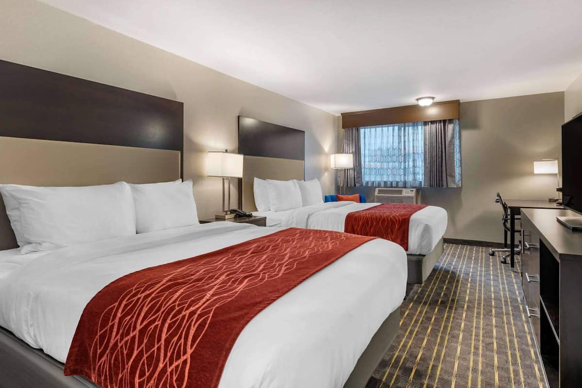 Premium bedding, pillowtop beds, blackout drapes, iron/ironing board