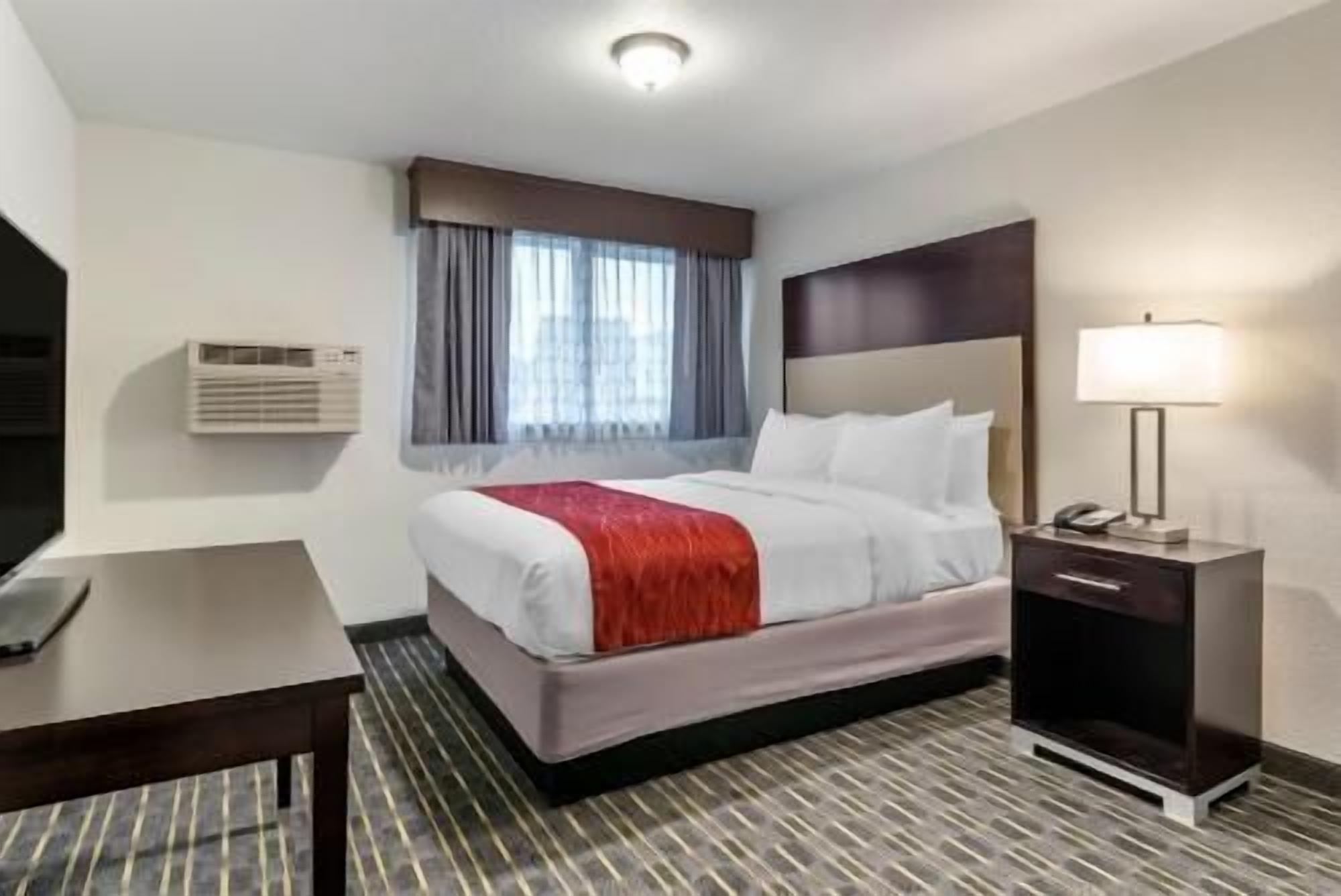 Premium bedding, pillowtop beds, blackout drapes, iron/ironing board
