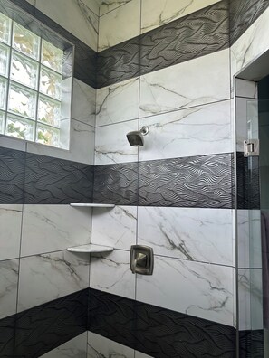 Bathtub, hair dryer, towels, soap