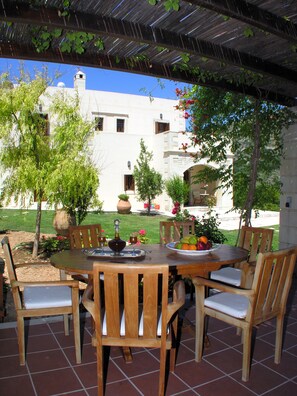 Outdoor dining - Luxurious villa with huge garden & private Heated pool in paradise environment (Rethymno, Crete)