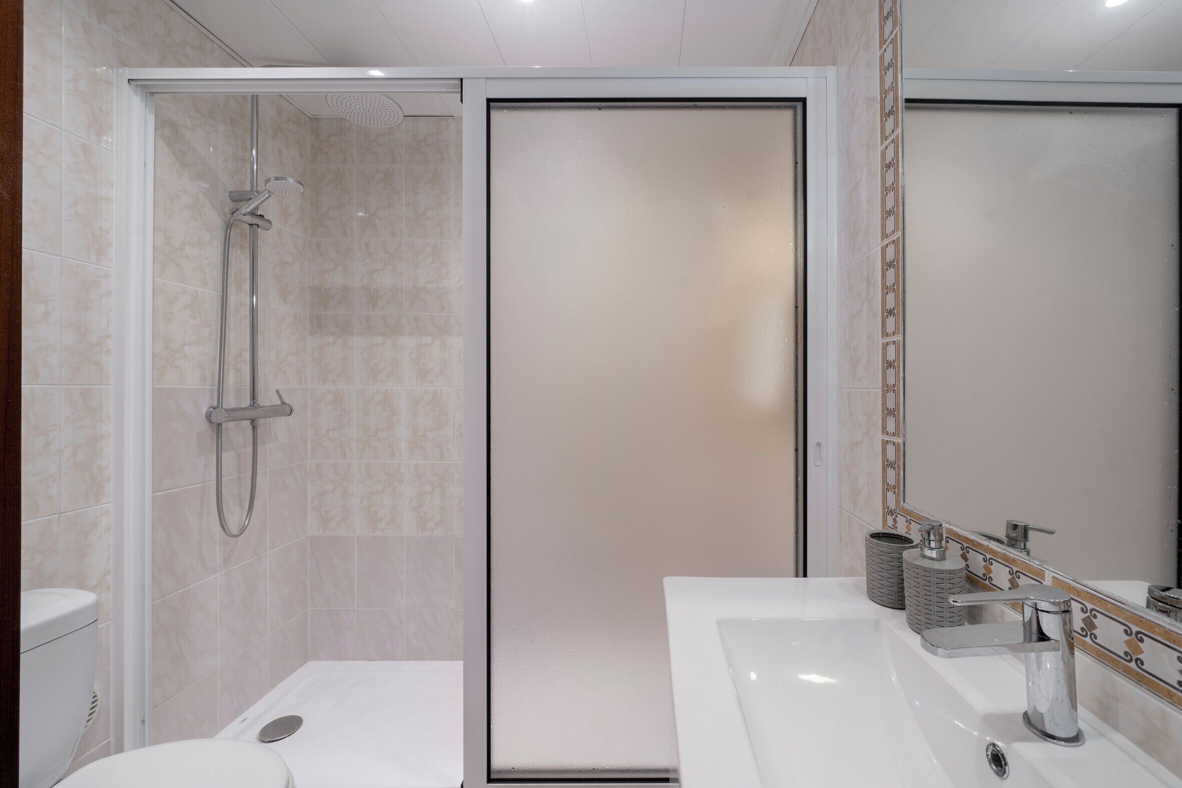 Bathtub, hair dryer, towels